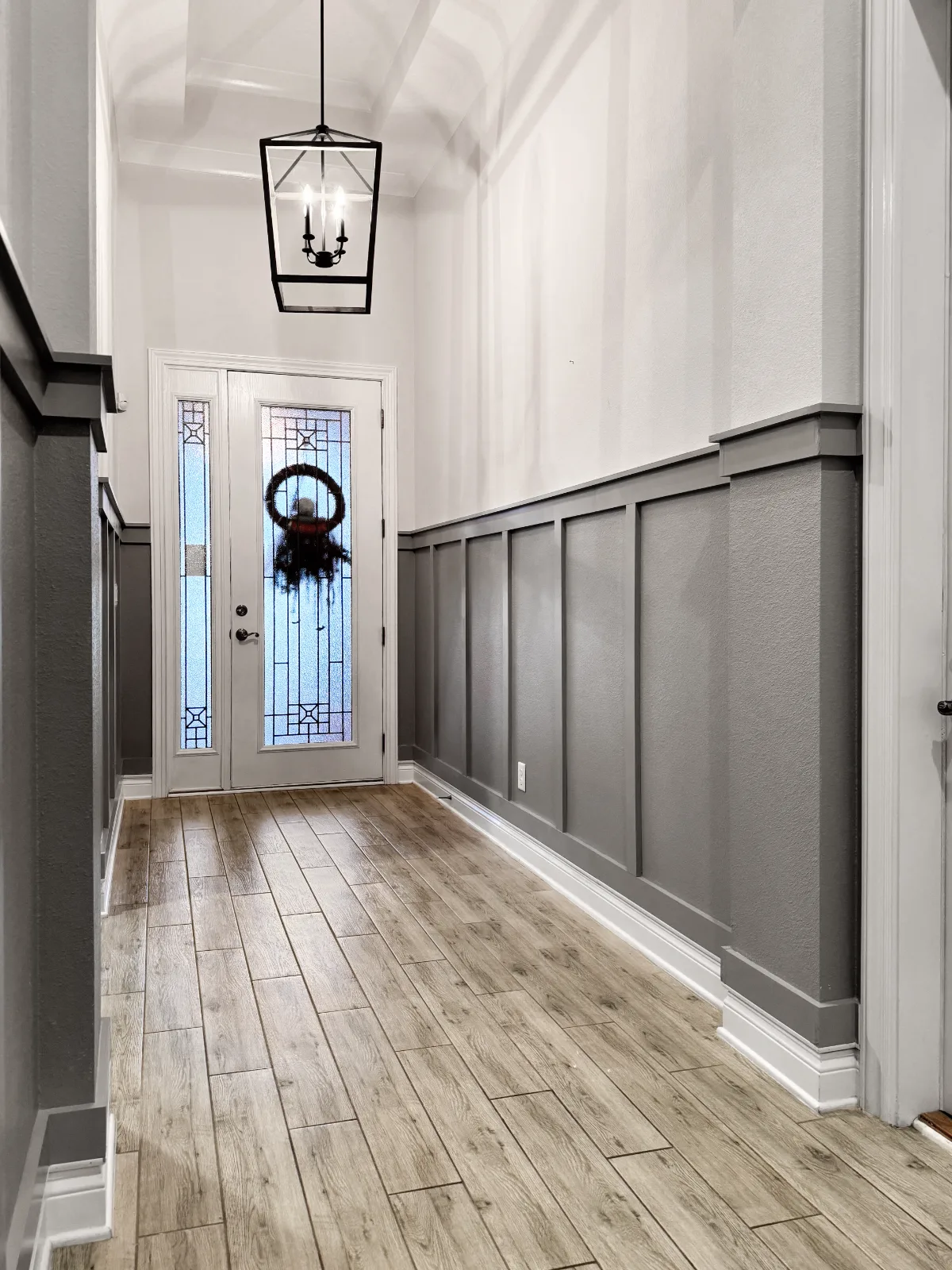 Hallway after full board and batten installation in Nocatee, FL