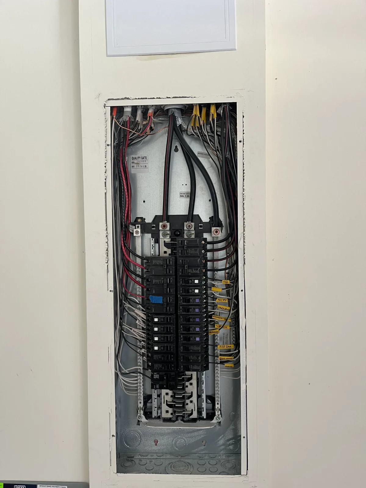 Electrical panel before EMP Shield whole-house surge protector installation in St. Johns, FL